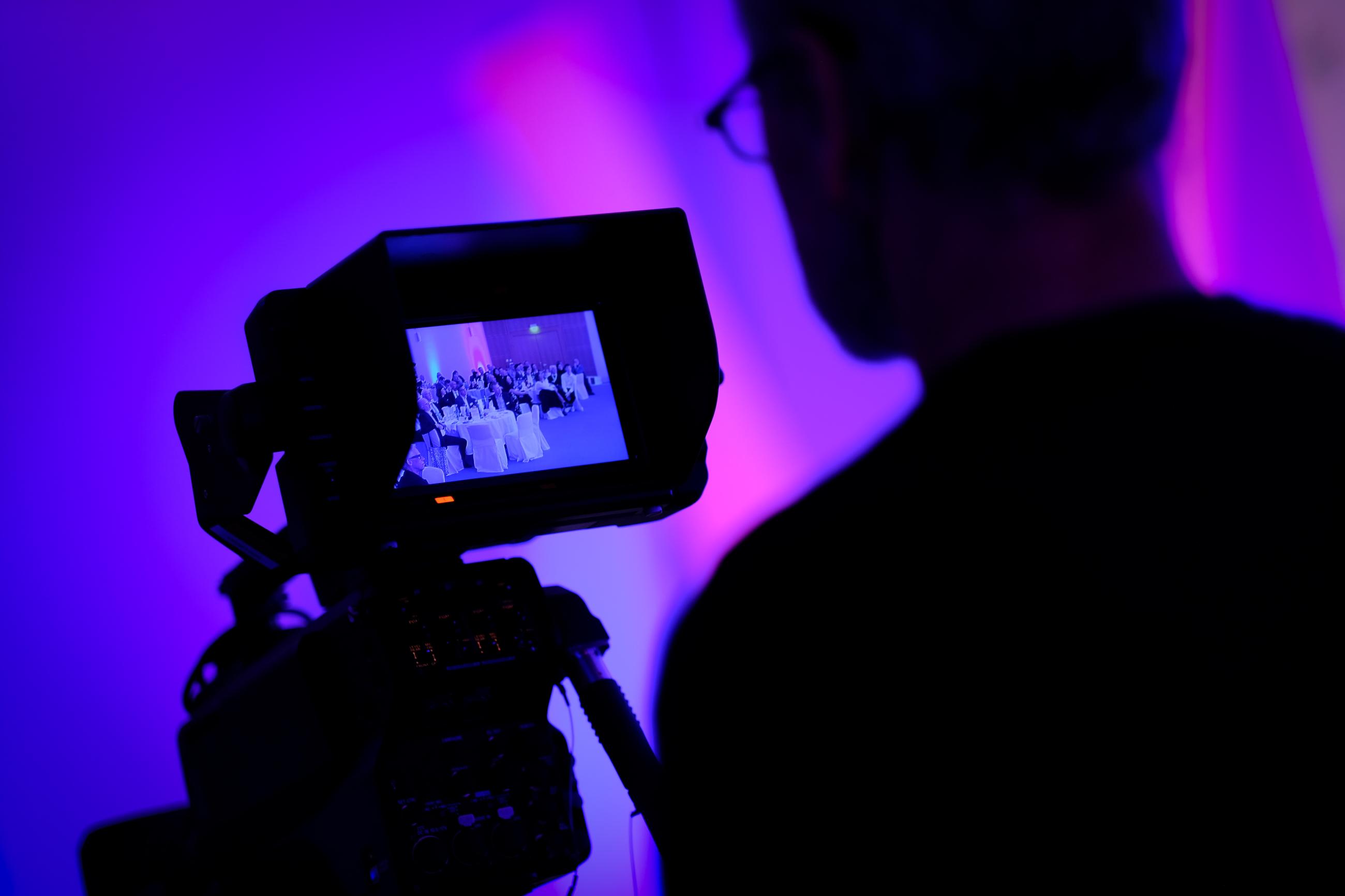A camera operator records the IAKS gala night at 29th IAKS congress
